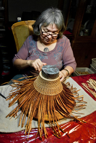 Weaving a cedar hat